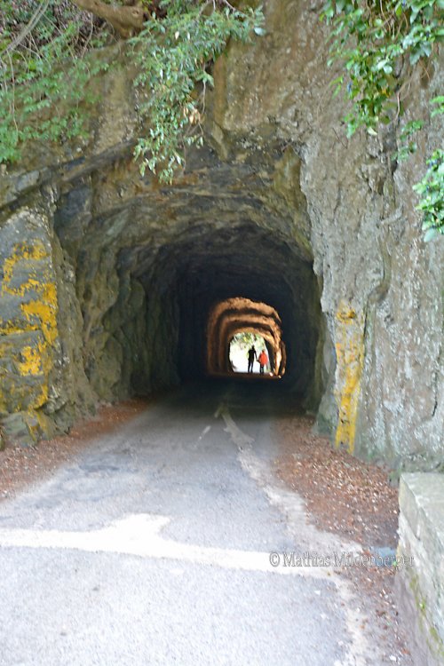 Corniche de la Castagniccia, close to the waterfall. Marked as main road on the map. The tunnel is 2.10m / 7ft wide, and 2.50m / 8 ft 3in wide,